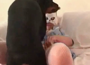 Pretty pussy getting licked by a black mutt