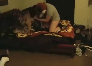 Creepy mask dude fucking a dog on cam