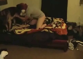 Creepy mask dude fucking a dog on cam