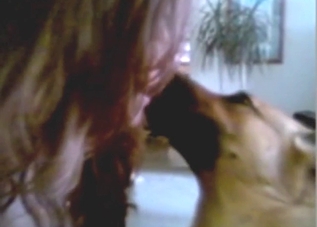 Brunette babe making out with a nice doggo here